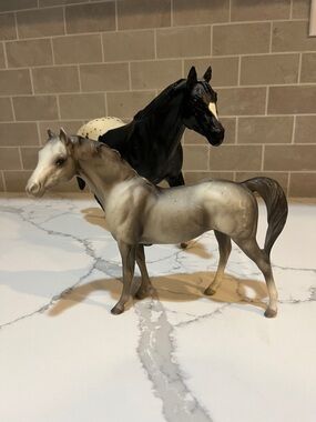 2 Breyer Reeves horses. Grey with black mane and tail and white muzzle
